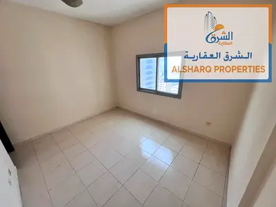 Al Nuaimiya 1, directly in front of Al Nuaimiya Towers: separate living room, balcony with an open view, and a reasonable price.