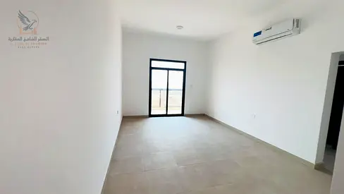 A spacious two-bedroom apartment with a living room and high-end finishes, featuring three bathrooms and two balconies, situated in a prime location
