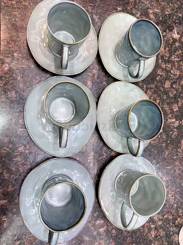 Set of 6 porcelain coffee cups with saucers, never used, price negotiable