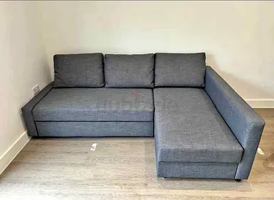 L-shaped grey fabric sofa bed with chaise (right side) - good condition