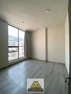 New 2BR in Al Jurf 3, master room, 3 baths, central AC, behind China Mall, AED 36,005 yearly.