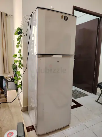 White Double-Door Refrigerator – Good Working Condition