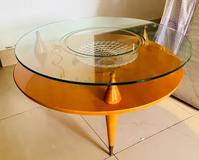 Mid-century round glass top wooden coffee table with lazy Susan