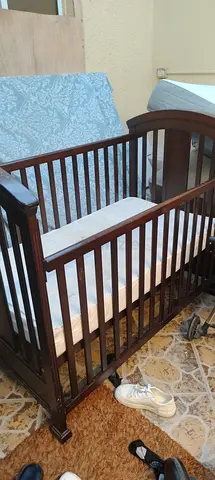Dark wood baby crib with mattress - good condition ( URGENT SALE )
