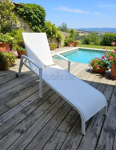 White outdoor sun lounger / poolside reclining chair