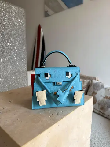 Light blue top-handle women's handbag - small structured leather bag