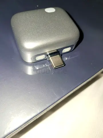 Charger that disconnects automatically when device charged fully. In pack unused