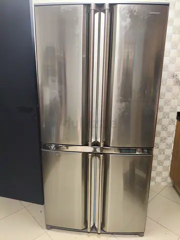 Sharp 4-Door Stainless Steel Refrigerator - Good Condition
