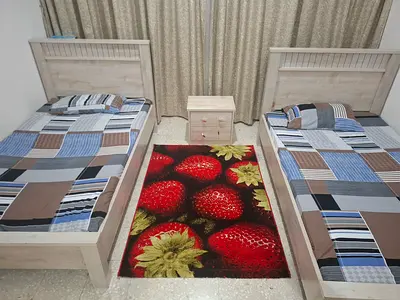 2 Double-Sized Beds, 2 mattresses and A night table (Comodina) For 500 Aed