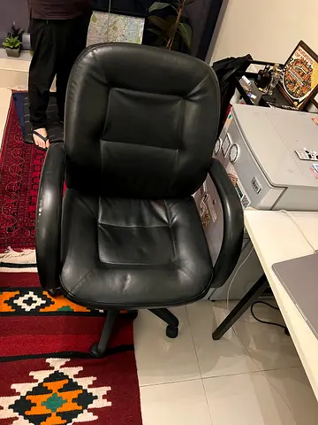 Black leather office chair with armrests - good condition
