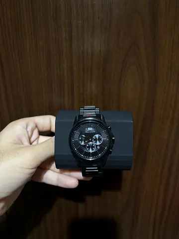 Black men's chronograph wristwatch with metal bracelet - good condition