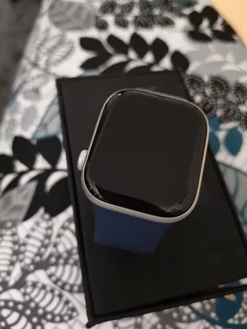 Apple Watch series-style smartwatch with blue strap - good condition