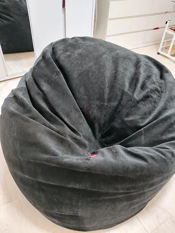 Large Black Velvet Bean Bag Chair - Comfortable Lounger. Bought for 1K. It's too big, hence selling.
