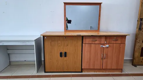 Used wooden dresser with mirror and storage cabinets - good condition