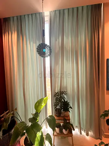Light teal blackout curtains - set of two panels, good condition- light blue 290 x 280