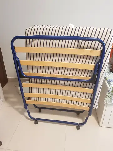 Foldable single guest bed frame with slats - good condition