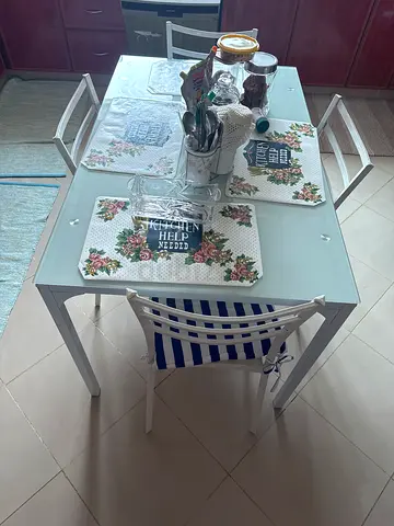 Glass Top HomeBox Dining Table with 4 White Chairs - Perfectly Good Condition