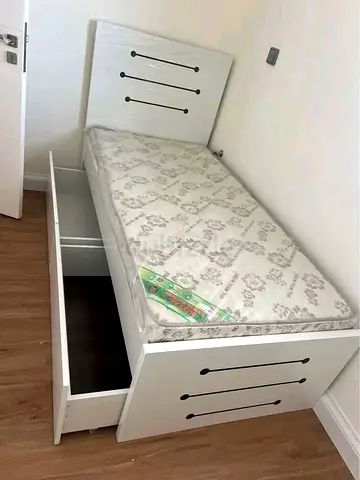 Single white MDF bed with storage drawers and mattress
