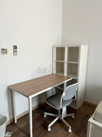 Desk with cabinet and chair