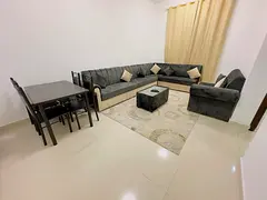 Furnished One-bedroom apartment with a living room for monthly rent in Ajman – Al Nuaimiya 1 – K