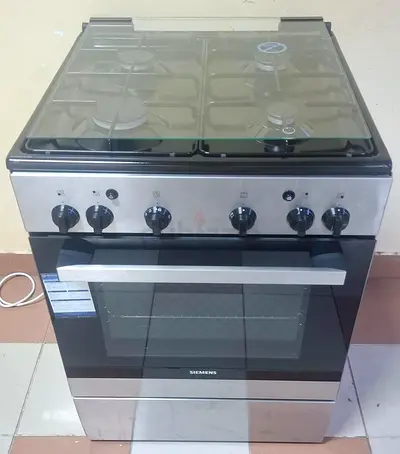 Siemens 4 burner fulll gas cooker same like a new condition arrange warranty also delivery