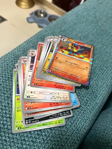 Bundle of Pokémon Trading Cards – Various Types and Conditions