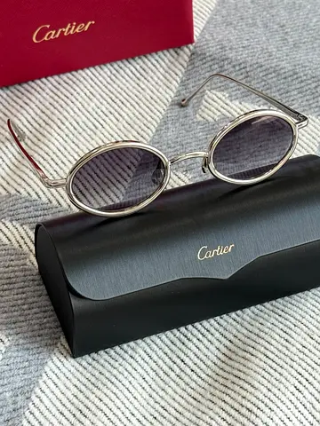 Cartier round metal sunglasses with case