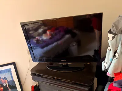 Samsung TV and 3 drawer unit