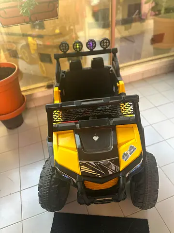 Kids electric ride-on buggy — good condition, dual seat