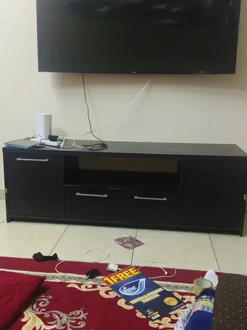 Dark wood TV cabinet / media console - good condition