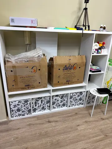 White IKEA Kallax Storage Unit without inserts. Inserting basket not included.
