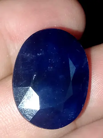 Oval deep blue faceted loose gemstone (approx. cabochon/oval cut)natural blue sapphire gemstone