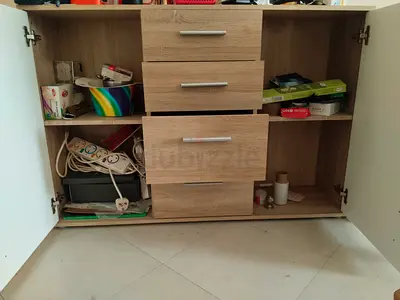 Light oak storage cabinet with 3 drawers and double doors - good condition