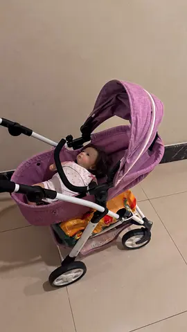 Toy Doll stroller with one doll Lightweight purple baby stroller/pram in good condition