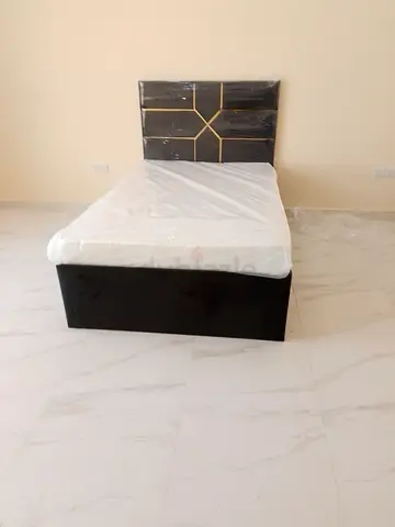Single bed with upholstered headboard and storage base - like new