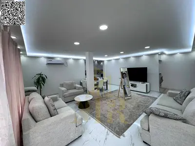 For sale in Al Rawda, Ajman – a luxury villa featuring a modern design and interiors that offer comfort and privacy.