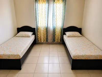 Pair of Single Wooden Beds with Headboards