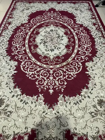 Classic burgundy and cream Persian-style rug - good condition