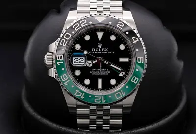 Rolex GMT-Master II “Sprite”, it is the green-and-black bezel GMT.