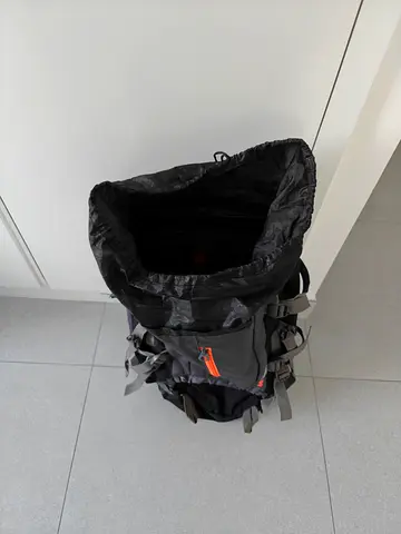 Used black hiking backpack - 40L approx, sturdy straps and compartments