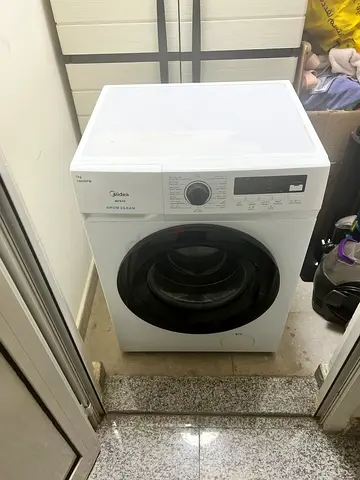 Front load washing machine - compact white unit, good condition