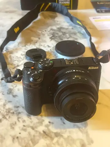 Nikon Z50 Mirrorless Camera with 16-50mm DX Lens and Strap