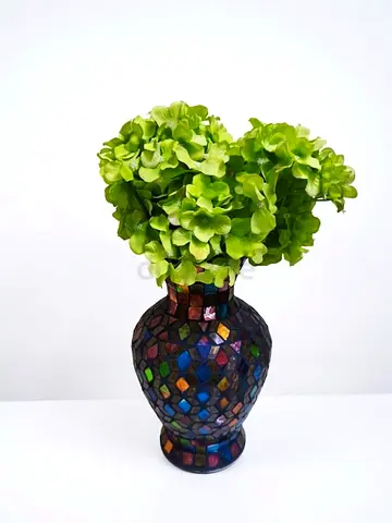 Decorative mosaic glass vase with artificial green hydrangeas
