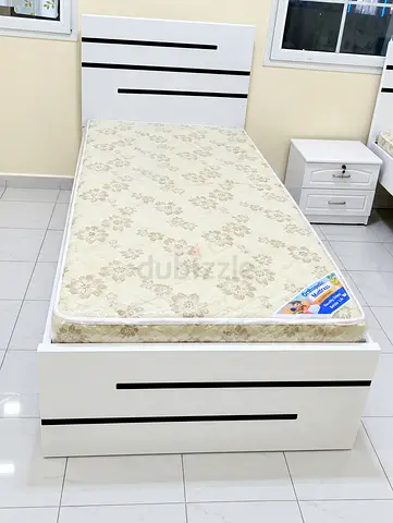 Brand new single size wooden Bed including mattress available