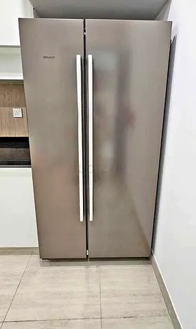 Siemens. Side by side refrigerator same like a new condition