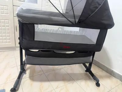Portable foldable baby bassinet / playpen in good condition, only used one time. New one