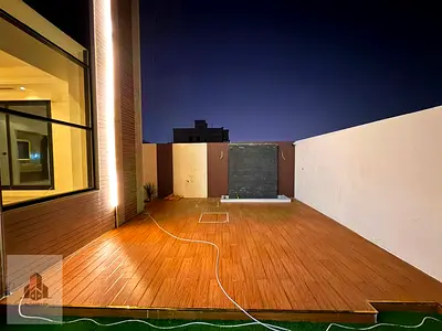 For sale in Al Helio 2, Ajman: a villa featuring 4 master bedrooms, a majlis, a living area, and a spacious with a maid's room.