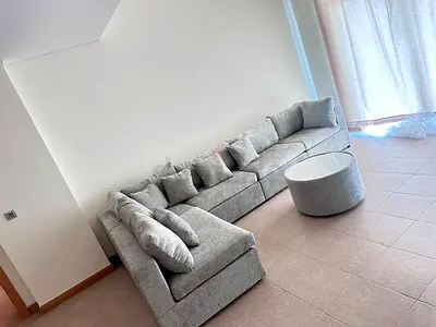 We are selling brand new L shape sofa with table beautiful grey color available