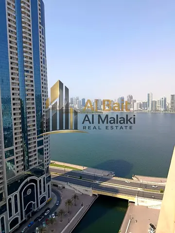 Spacious 2-Master-Bedroom Apartment for Annual Rent in Al Qasba, Sharjah – 4 Bathrooms, Central AC, Free Parking, Flexible 4 or 6 Installments & Excel