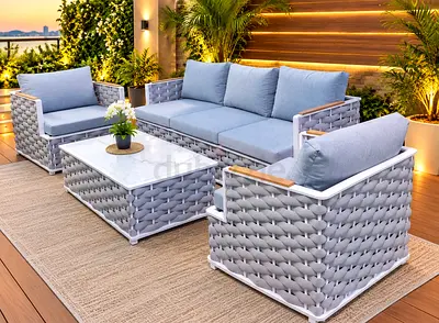4-piece Outdoor Wicker Lounge Set with Cushions and Coffee Table